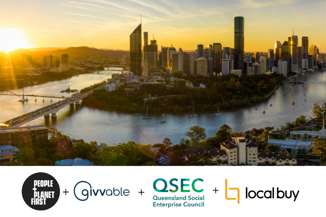 A photo of Brisbane city at sunset with the buildings in the background and the sun setting over the river.